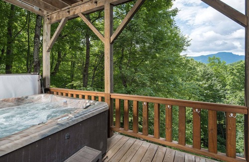 Seven Devils Cabin | 4 BRLog Cabin with Grandfather Mountain Views, Hot Tub, Game Room & Spacious Decks