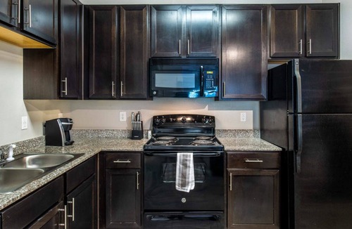 Garner Apartment | Modern Apartment in Prime Location (ID7473X04)