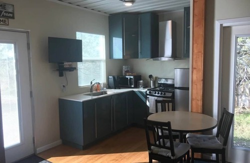 Lockhart House | Tiny Home/Double ContainerHome “Jolly Green Giant”