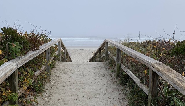 Beach lovers delight! Inground Heated Pool. Walk to beaches and town.