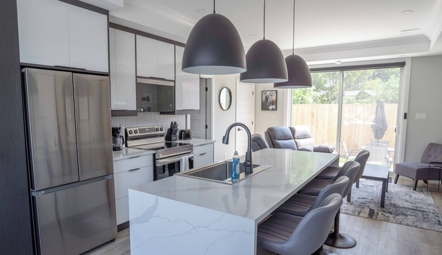 Bridgeview Point South- Designer Home in the Perfect Location with Balcony Views in Point Edward