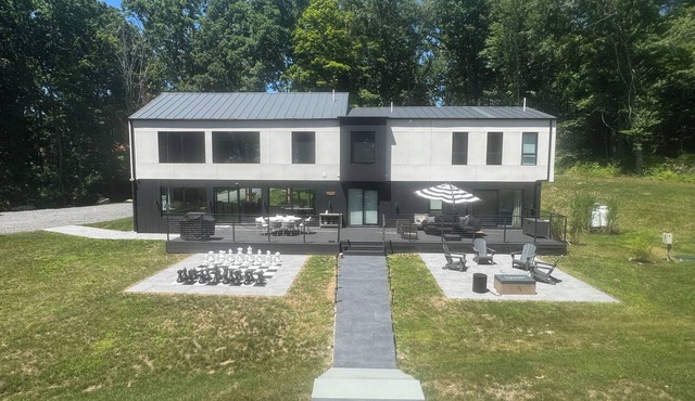 Experience elevated living in a magnificent brand new modern home set on 5 acres