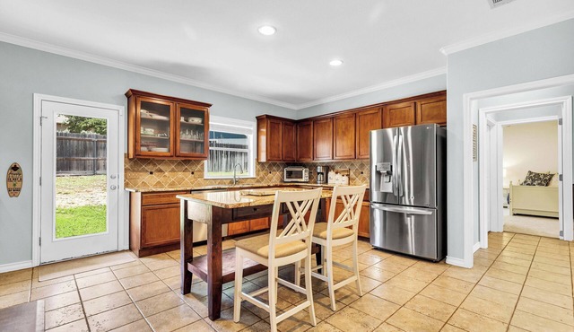 Lake Travis family-sized lakehouse with game room, deck and private beach access