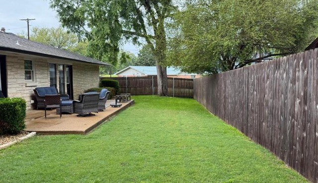 This spacious 4-BDRM, 2-BA home is a western YeeHaw Haven